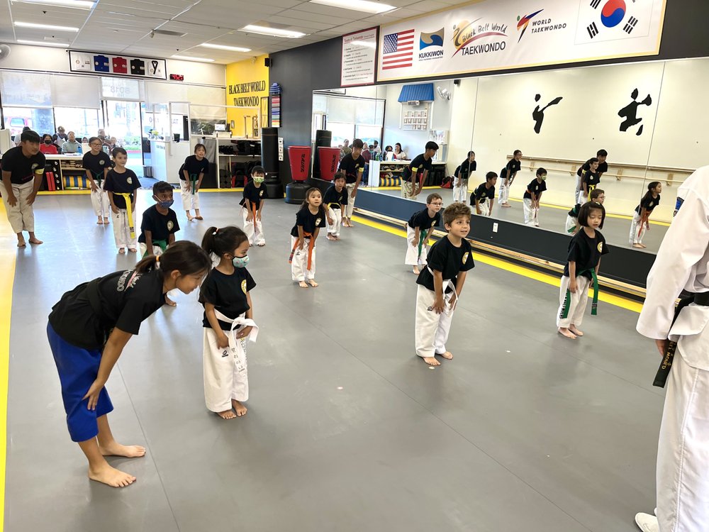 Kids and parents training together at Black Belt World Family Class